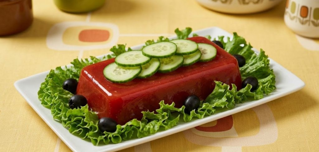 A photo of vintage tomato aspic served on a platter.
